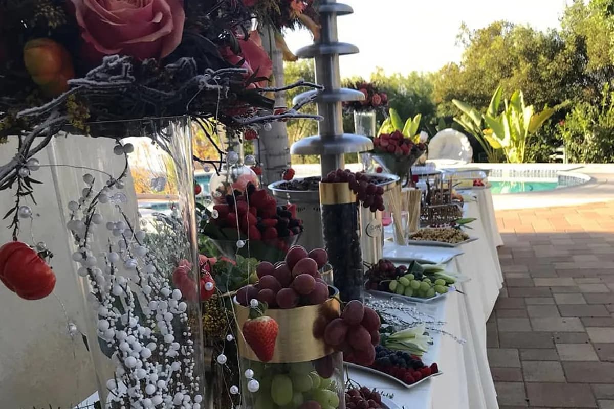 A chocolate dipping table at a catered event