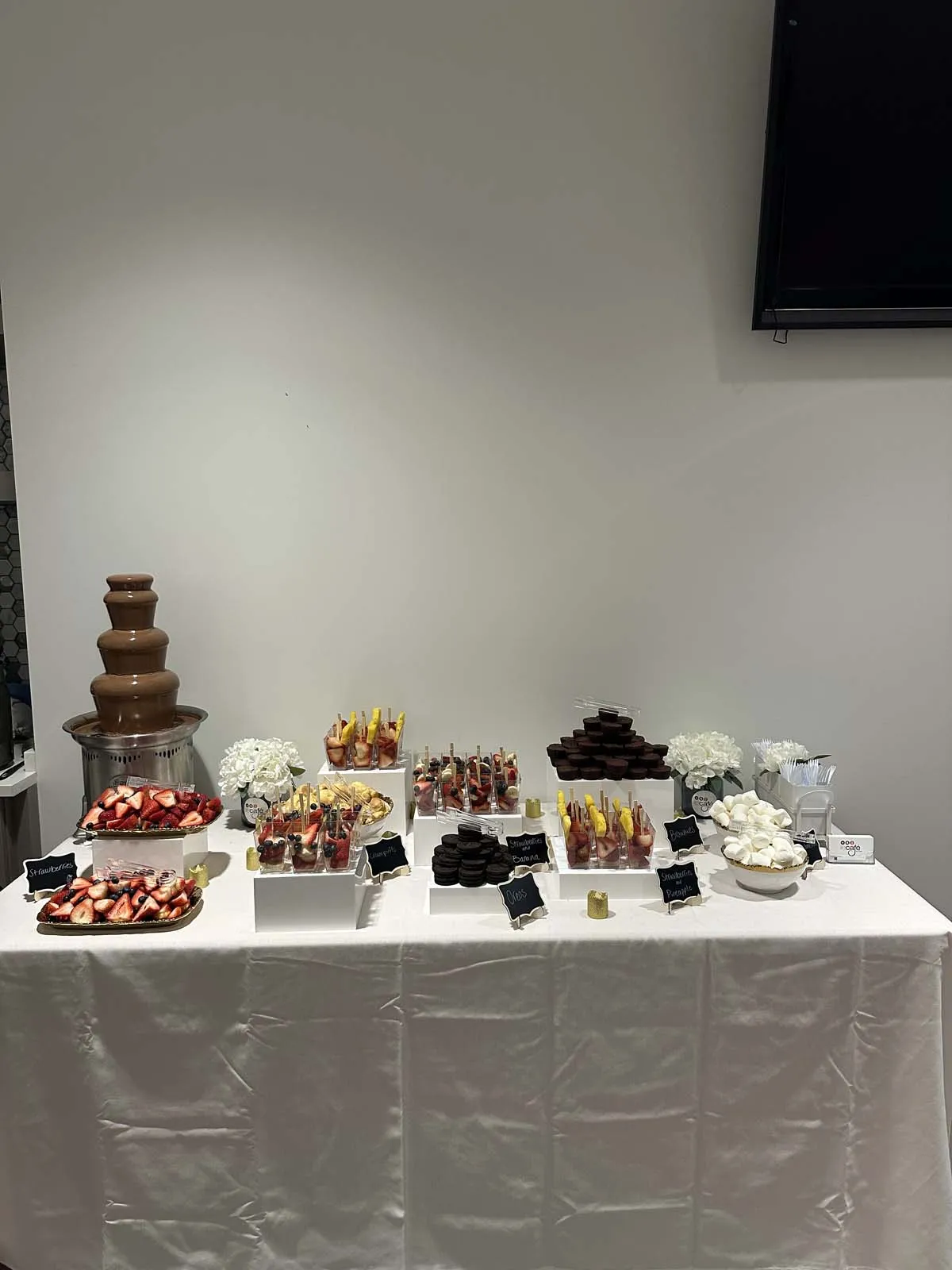 A chocolate dipping table at a catered event